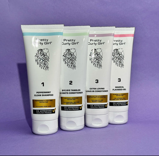 Haarproducten van Pretty Curly Girl met paarse achtergrond