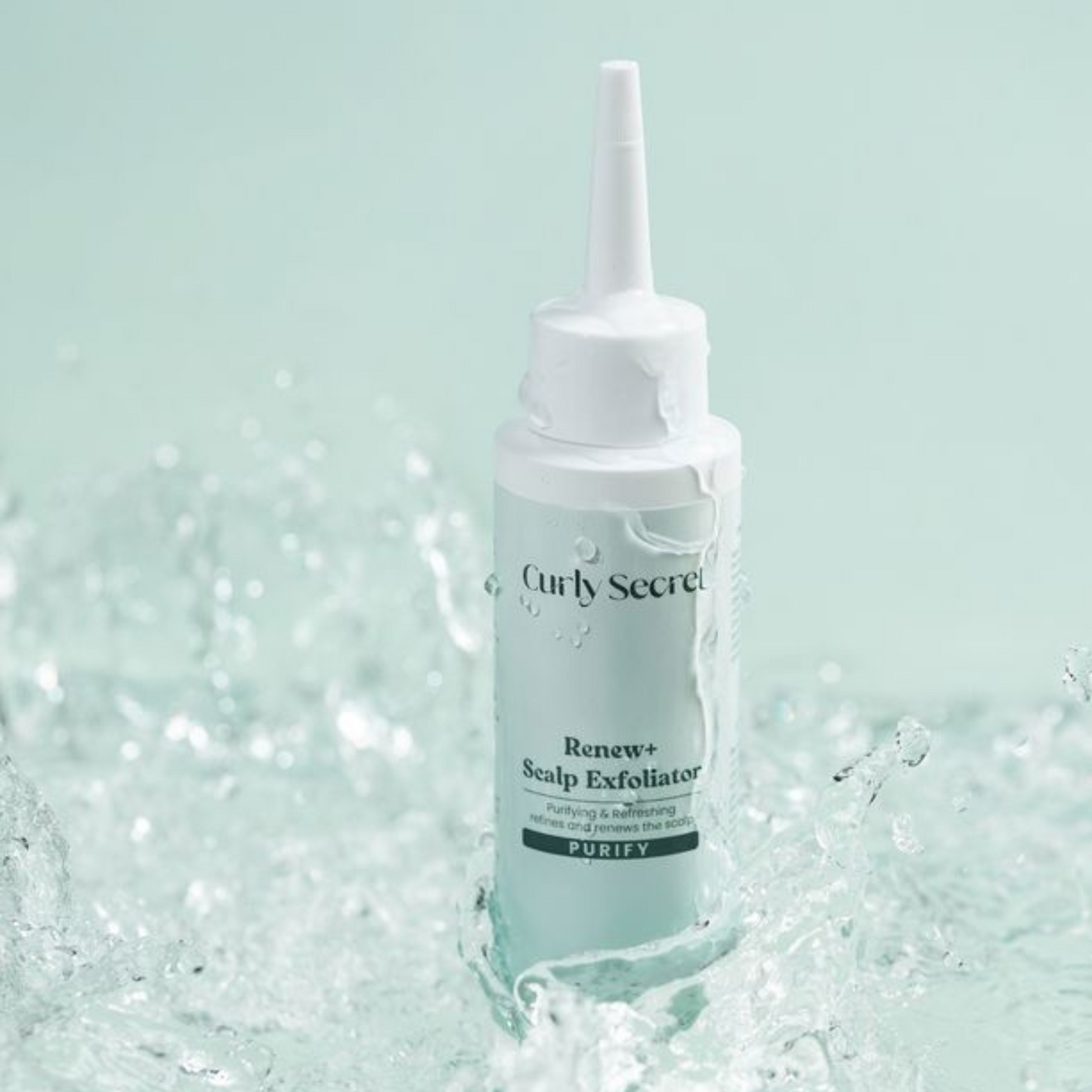 Curly Secret Renew+ Scalp Exfoliator met water