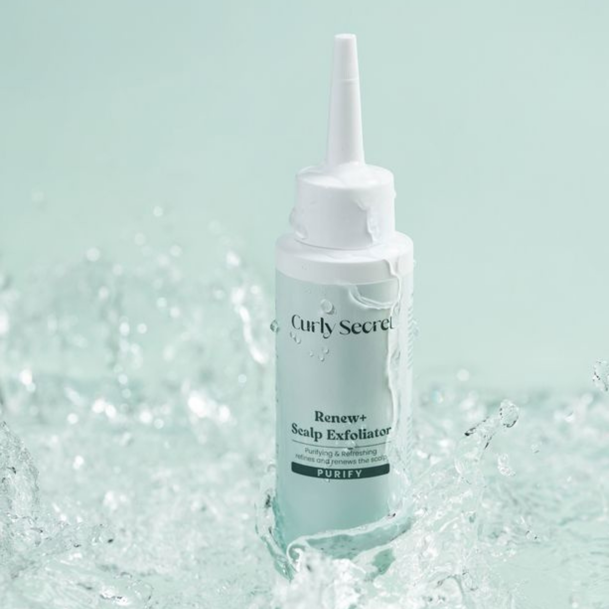 Curly Secret Renew+ Scalp Exfoliator met water